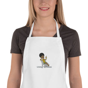 Embroidered Apron Woman in Lounge Chair