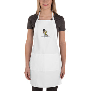 Embroidered Apron Woman in Lounge Chair